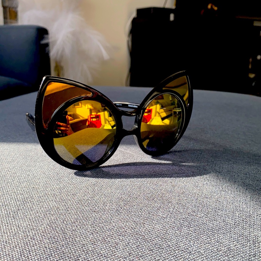 Linda farrow kaleda Rajab + falafel almarzouq sunglasses